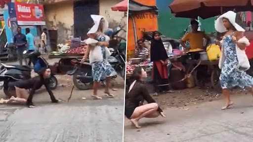 Video- Woman Walking Another Woman On Leash: நாயாக மாறிய பெண்... கட்டி இழுத்துச் செல்லும் மற்றொரு பெண்..!